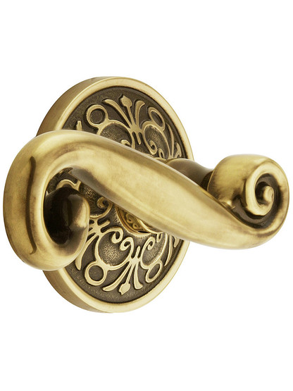 Lancaster Door Set With Scroll Design Levers Left Hand in Antique Brass.